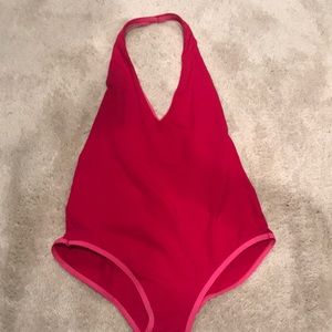 Magenta body suit